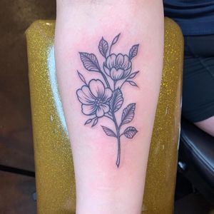 A stunning illustrative flower tattoo by Kat Freedman, perfect for your forearm. Embrace the beauty of blackwork style.