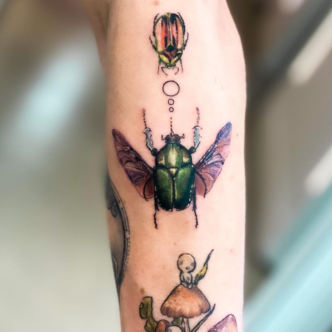 A steampunk tattoo of a clockwork scarab beetle with brass mechanical  innards | Ratta Tattoo