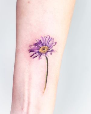 Elegant and detailed flower design by Juliany Braga, perfect for showcasing on your forearm.