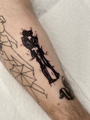 Get inked with a stunning blackwork skeleton design on your arm by the talented artist, Miss Vampira. A unique and illustrative piece for a bold statement.