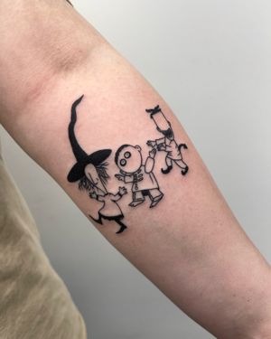 Embrace the darker side with this detailed blackwork tattoo by Miss Vampira, featuring a witch and a mysterious kid.
