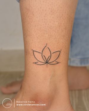 Line Art Lotus Tattoo done by Maverick Fernz at Circle Tattoo Studio