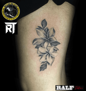 black and gray flower tattoo