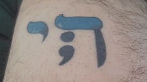 Chai meaning life in Judaism and semicolon to represent suicidal awareness. 