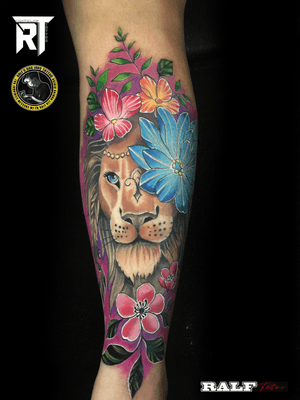 customized lion with flowers tattoo