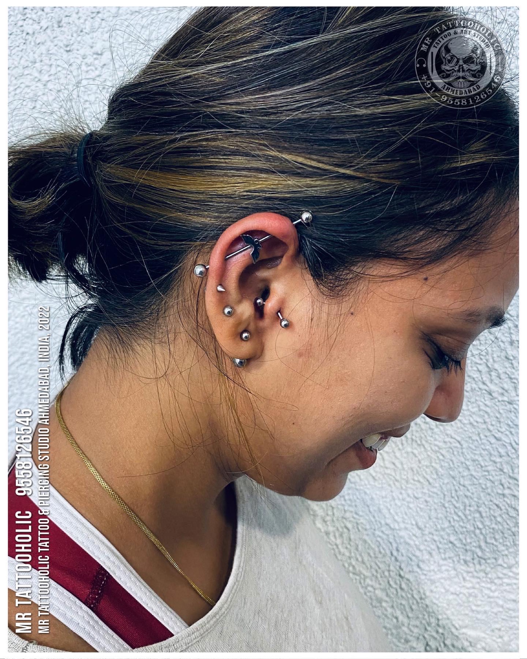 Minimalist Ear Tattoos Are Fast Becoming A Trend