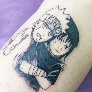 Get a stunning blackwork Naruto boy tattoo on your arm by talented artist Greed. Embrace the power and spirit of this beloved anime character in a unique illustrative style.