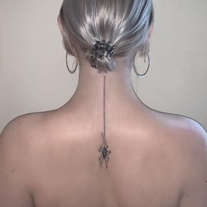 Amazing blackwork spider design by Amour.x, combining fine line and illustrative styles for a bold and unique tattoo.