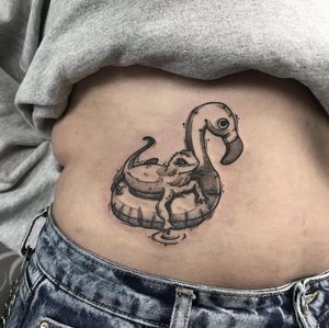 Elegant blackwork illustration by Emiliia Kuzmina showcasing playful motifs of lizards, ducks, and flamingos on ribs.