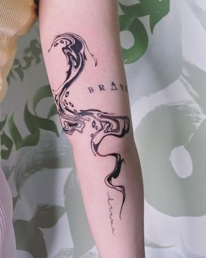 Unique pattern design in bold blackwork style, expertly crafted by tattoo artist Greed on the forearm.