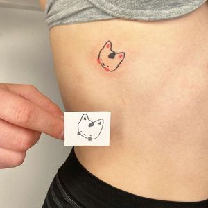 Elegant and delicate cat tattoo by Silber/Sofie, perfect for rib placements. Showcase your feline love with style.