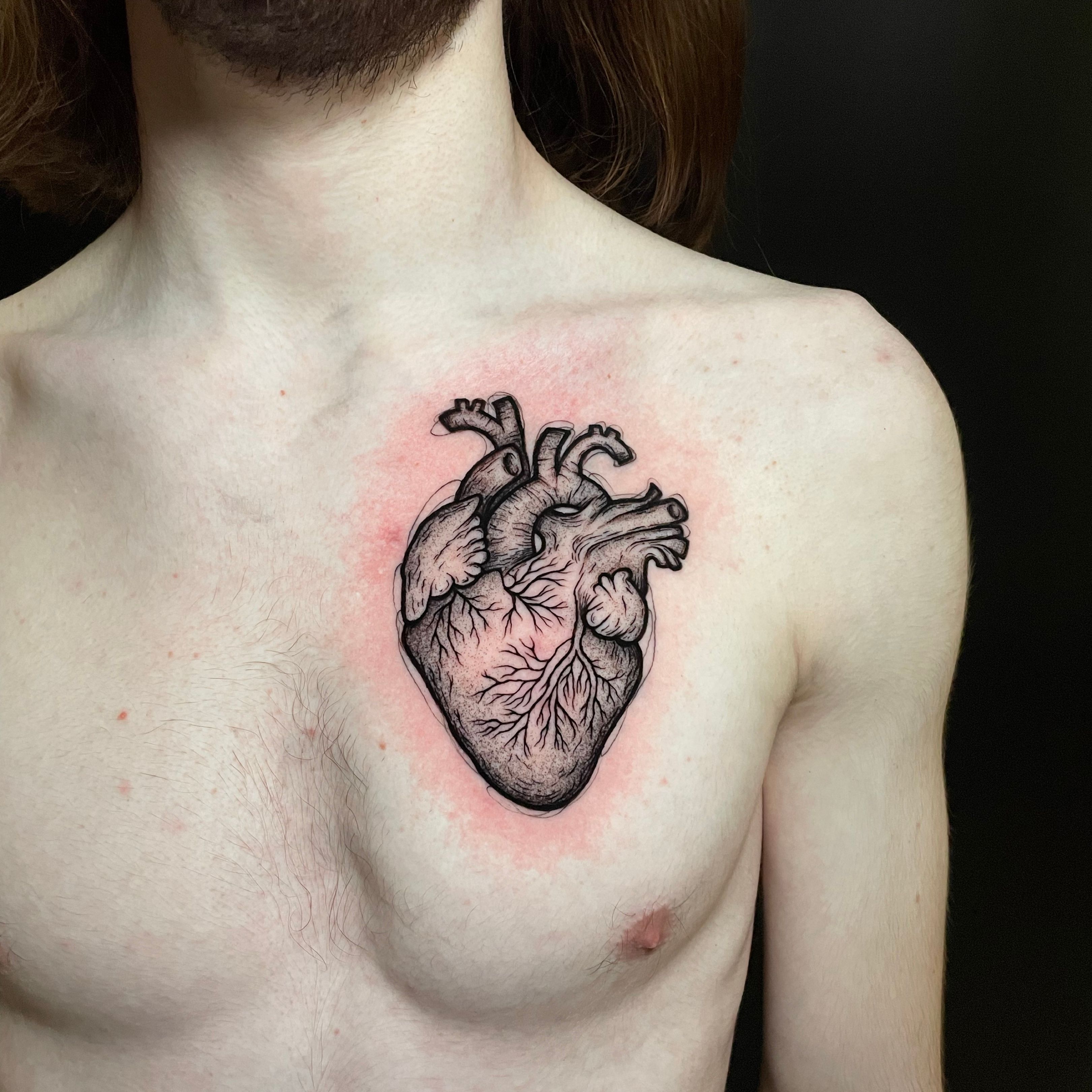 Em Morris on Instagram Amazing anatomical heart glow hands chest tattoo  by Norman Shovel normanshovel  inkedmag worldofartists inksav gq  ink