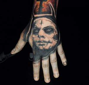 Dark nun hand tattoo 