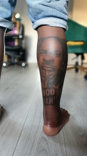 Black Guy Leg Tattoo