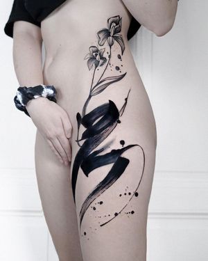 Unique illustrative tattoo by Joza featuring intricate floral design. Perfect for bold statement piece on upper leg.