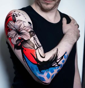 Get a stunning illustrative blackwork tattoo of a detailed flower pattern on your arm by the talented artist Joza.