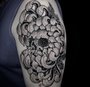 Elegant black and gray design by Matthew Ono, featuring a chrysanthemum flower entwined with a skull motif