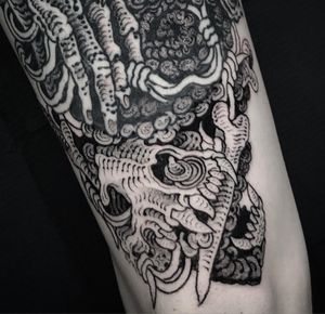 A bold black and gray design featuring a skull, bones, and fingers, expertly done by Matthew Ono. Perfect for those who appreciate dark and intricate artwork.