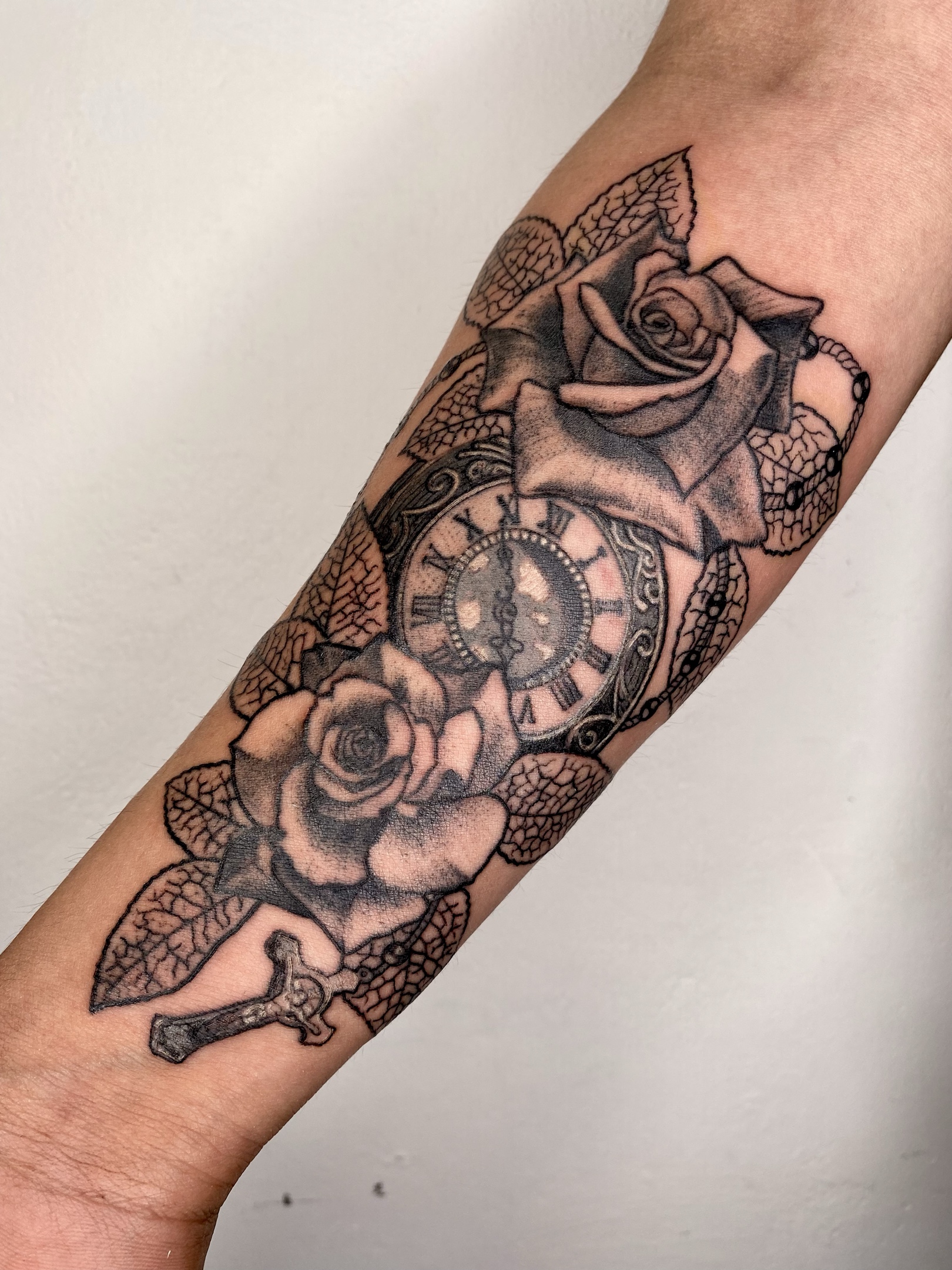 Tattoo rosas con discount reloj