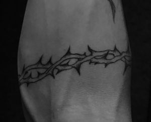 arm tattoo, barbed thread