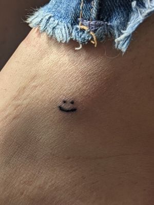 First self done stick n poke. Tiny smiley face on my ankle bone.