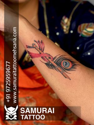 flute with feather tattoo |Krishna tattoo |Lord krishna tattoo |Flute with feather tattoo ideas
