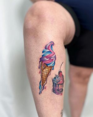 Get a deliciously colorful tattoo featuring ice cream, cherry, cupcake, and candy motifs by artist Vic on your shin.