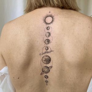 Capture the beauty of the night sky with this stunning blackwork tattoo featuring moons and planets by Palena.