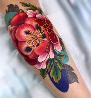 Beautiful forearm tattoo featuring a realistic illustrative flower in dotwork style by Daniel Verdysh.