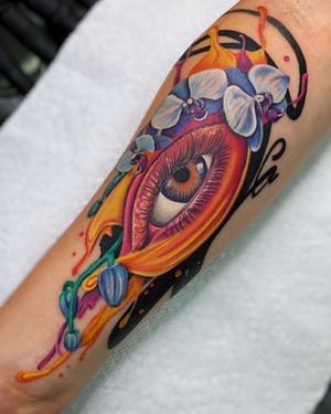Capture the beauty of nature and mystique with this illustrative forearm tattoo by Daniel Verdysh.