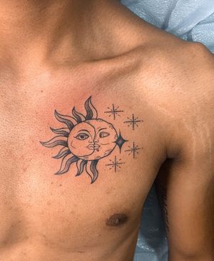 Unique fine line tattoo featuring a sun and moon design by Steven Brooks, beautifully placed on the chest.