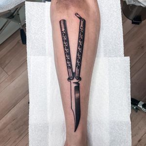 Blackwork design by Jenna Jeep, featuring a detailed knife motif on the lower leg.