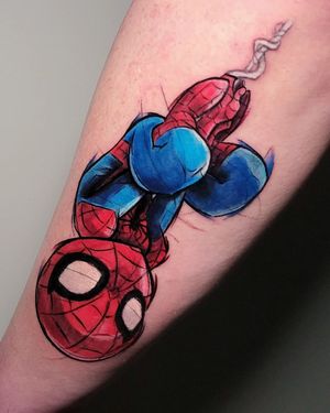 Get a vibrant new school style Spider Man tattoo on your forearm by the talented artist Inkcognito. Stand out with this illustrative design!