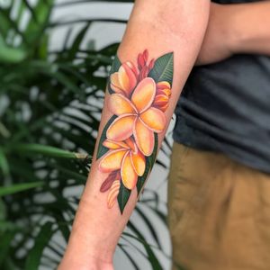 Stunning illustrative flower tattoo on forearm, executed with precision by artist Daniel Verdysh.