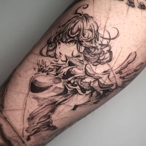Check out this stunning arm tattoo featuring a blackwork illustration of a girl, done by the talented artist Inkcognito.