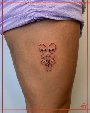 Experience out-of-this-world art by Tianna with this intricate fine line alien tattoo on your upper leg.