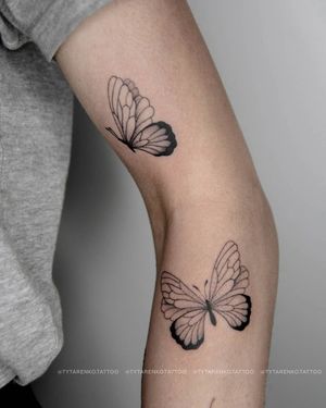 Get inked with a beautiful blackwork butterfly design on your arm by Kateryna Tytarenko. A stunning and unique piece of art!