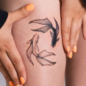 Discover the stunning blackwork fish tattoo design by Yasmin Clara, perfectly placed on the upper leg. Dive into this intricate masterpiece today!