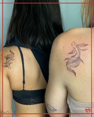 Get your unique blackwork fish tattoo done by the talented artist Tianna on your upper back for a bold and eye-catching statement.