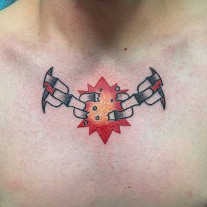 Get a bold and intricate chain design on your chest by tattoo artist Steven Brooks. Stand out with this unique piece of body art.