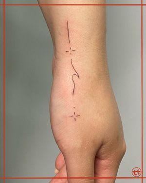 Adorn your hand with this beautiful fine line tattoo featuring a mesmerizing wave pattern design by the talented artist Tianna.