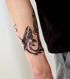 Experience the thrill of the hunt with this bold blackwork tattoo by the talented Jenna Jeep. Illustrative design guaranteed to make a statement.