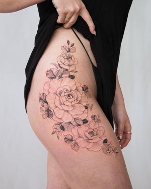 Adorn your upper leg with a stunning blackwork flower tattoo by Sasha Sunshine, perfect for those who appreciate detailed artwork.
