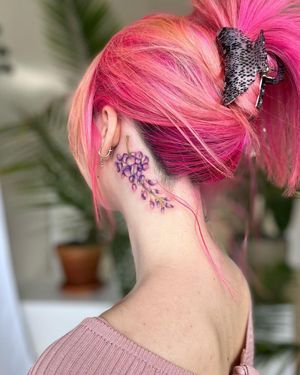 Beautiful illustrative watercolor flower tattoo on the neck by Stasy Galz. Add a touch of nature and art to your body!