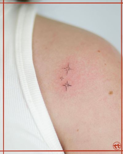 Elegant star design by Tianna, delicately inked on the shoulder for a subtle yet striking look.