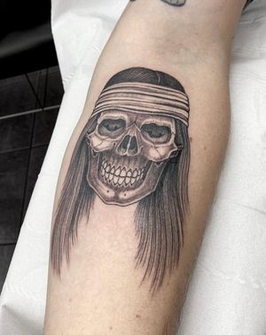 Elegant black and gray skull design by Sophie Rose Hunter, delicately inked on the arm.