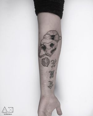 Unique blackwork design featuring a planet and skull by artist Ali Deeran. Perfect for bold and artistic individuals.