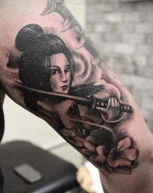 Tattoo by savage tattoo emporium