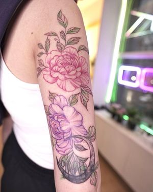 Elegant peony flower tattoo by Mengni Yang on the upper arm, showcasing detailed illustrative style.