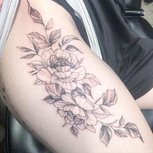 Get a bold and beautiful flower tattoo on your upper arm by the talented artist Pablo. Perfect for those who love blackwork style.